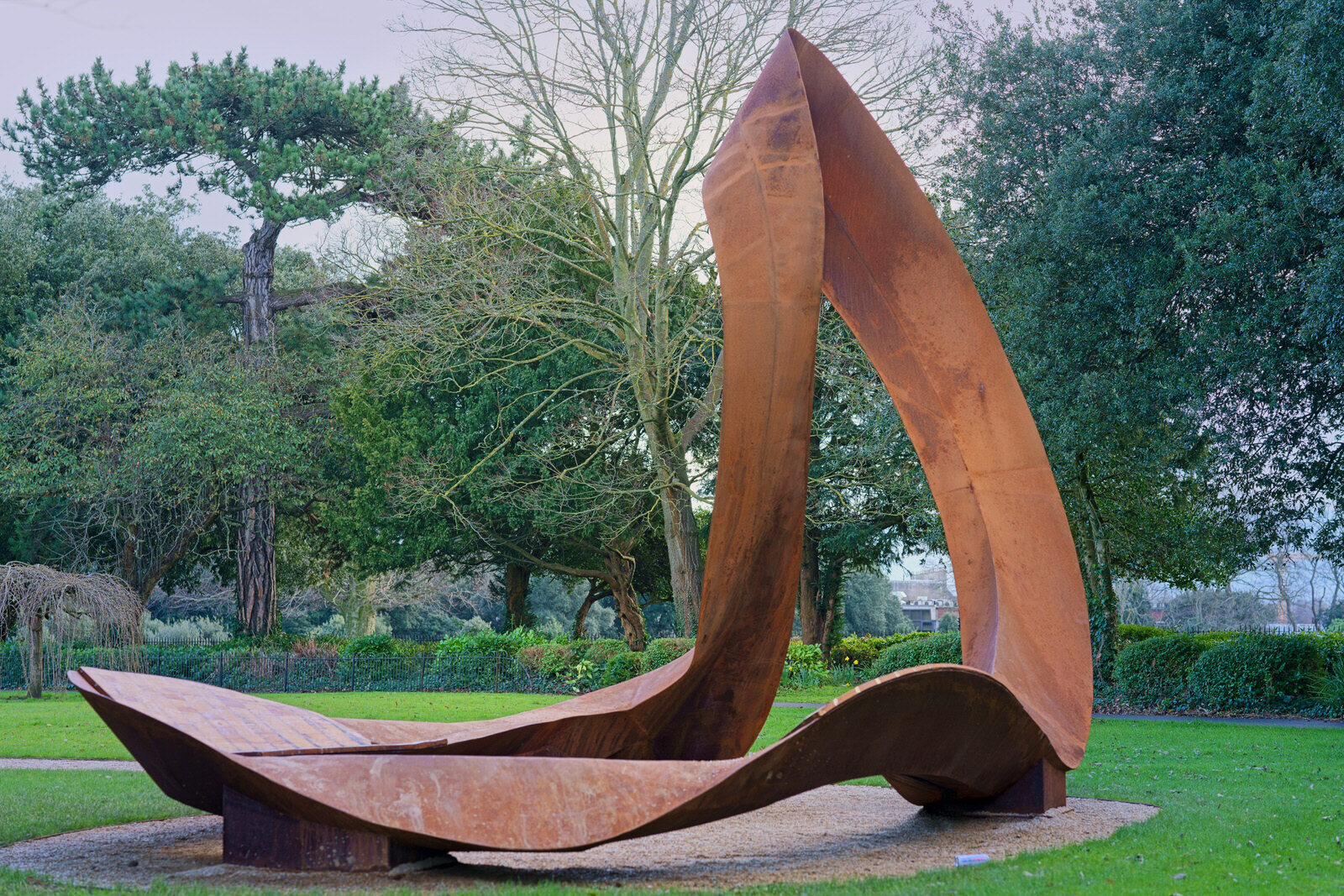 THE CONCRETE SHELTER AND THE CORTEN STEEL SCULPTURE [EMBRACED LOOP BY ANAISA FRANCO]-228472-1