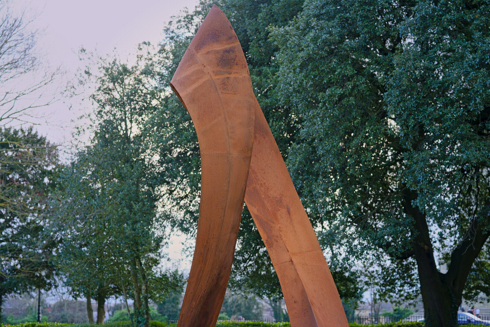 THE CONCRETE SHELTER AND THE CORTEN STEEL SCULPTURE [EMBRACED LOOP BY ANAISA FRANCO]-228474-1