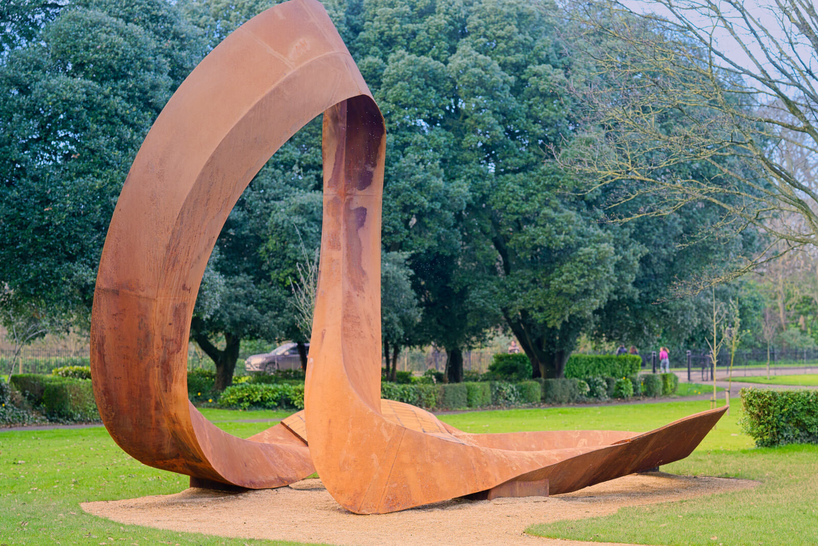 THE CONCRETE SHELTER AND THE CORTEN STEEL SCULPTURE [EMBRACED LOOP BY ANAISA FRANCO]-228478-1