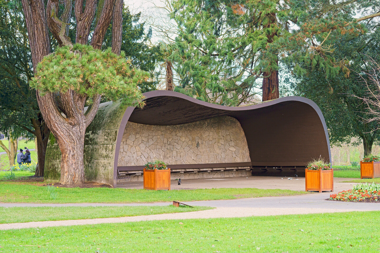 THE CONCRETE SHELTER AND THE CORTEN STEEL SCULPTURE [EMBRACED LOOP BY ANAISA FRANCO]-228479-1