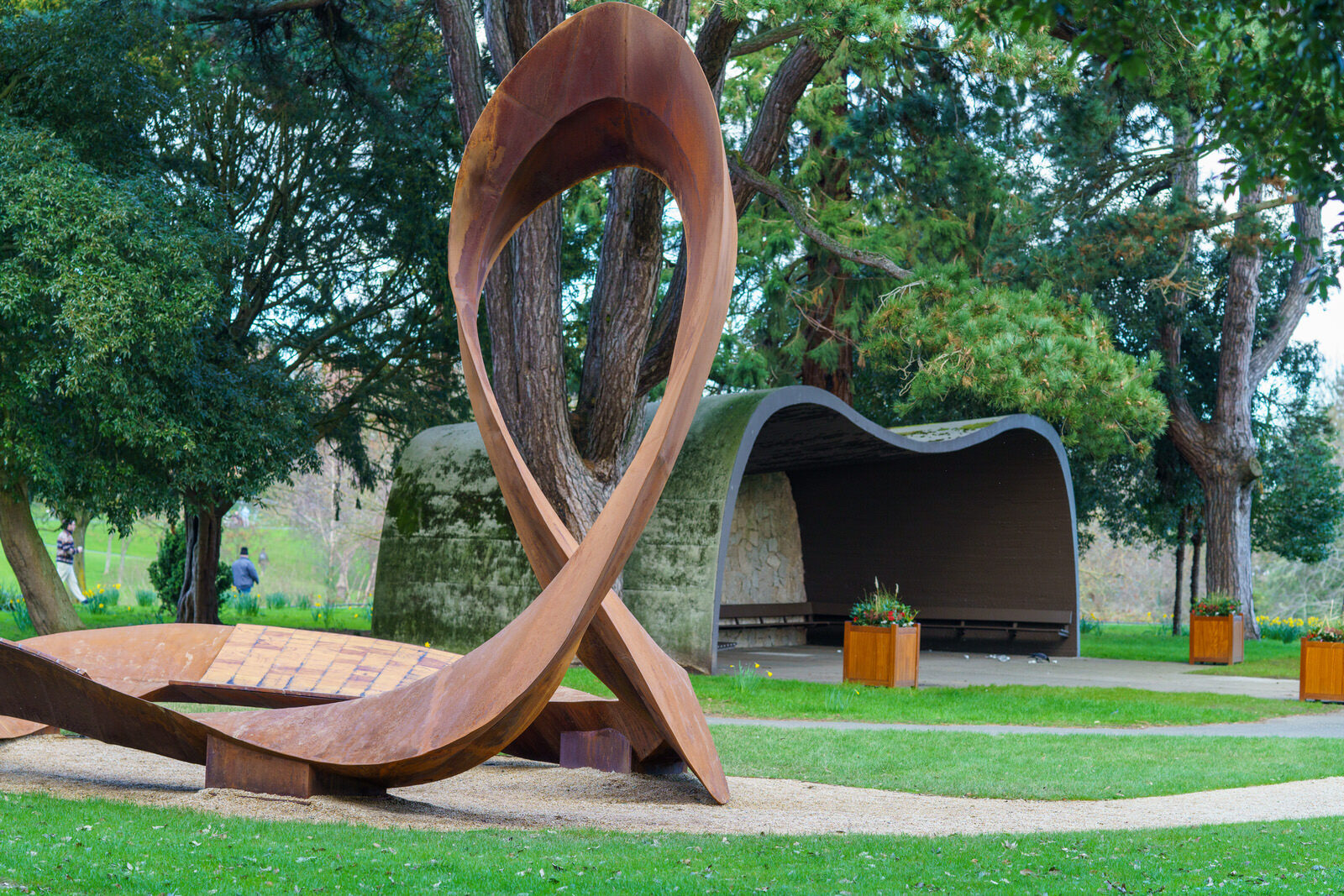 THE CONCRETE SHELTER AND THE CORTEN STEEL SCULPTURE [EMBRACED LOOP BY ANAISA FRANCO]-228484-1