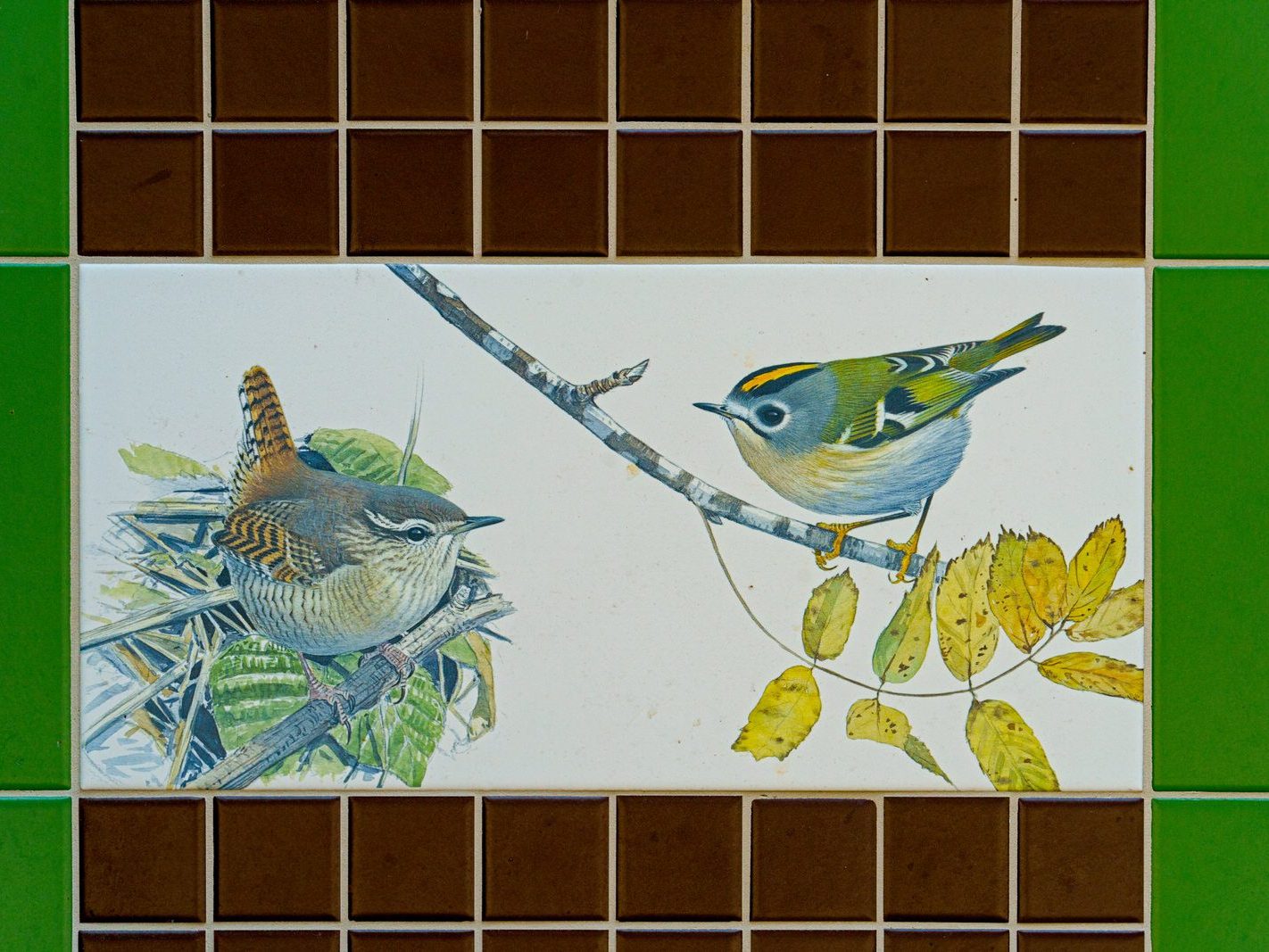 A SET OF THREE TILES FEATURING THE WREN AND THE GOLDCREST [BY KILLIAN MULLARNEY]-239286-1