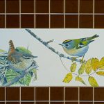 A SET OF THREE TILES FEATURING THE WREN AND THE GOLDCREST [BY KILLIAN MULLARNEY]-239286-1