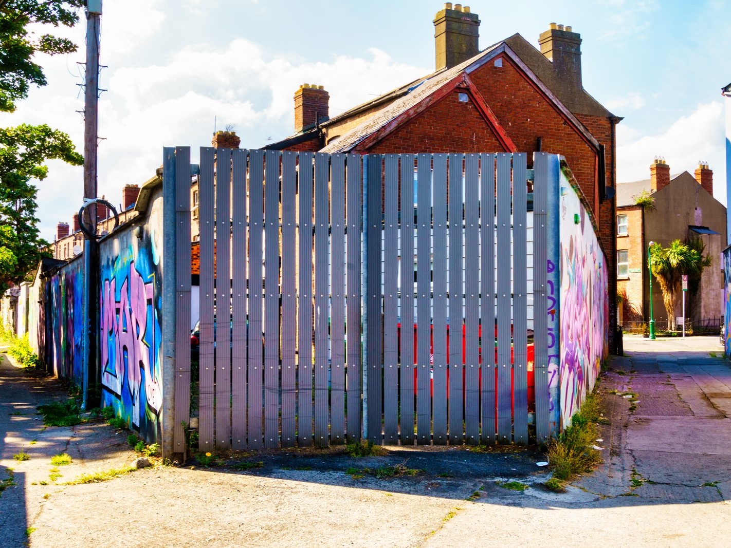 ST PETERS LANE IN PHIBSBOROUGH [BACK IN JULY 2022 IT HOSTED SOME MURALS BUT THE QUALITY WAS IN DECLINE]-244059-1