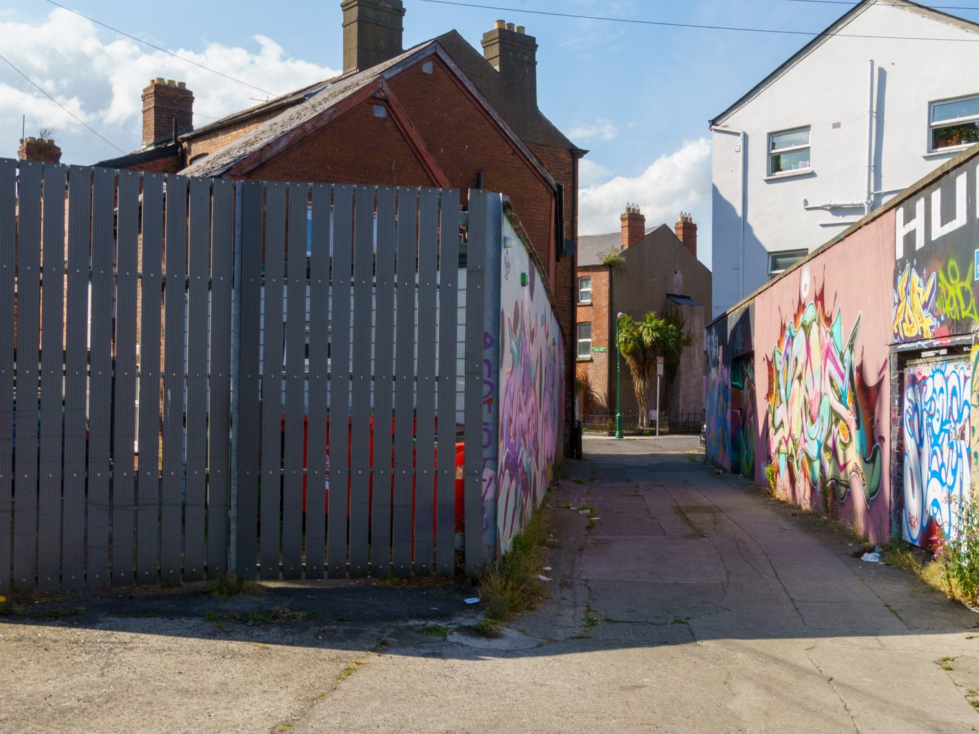 ST PETERS LANE IN PHIBSBOROUGH [BACK IN JULY 2022 IT HOSTED SOME MURALS BUT THE QUALITY WAS IN DECLINE]-244060-1