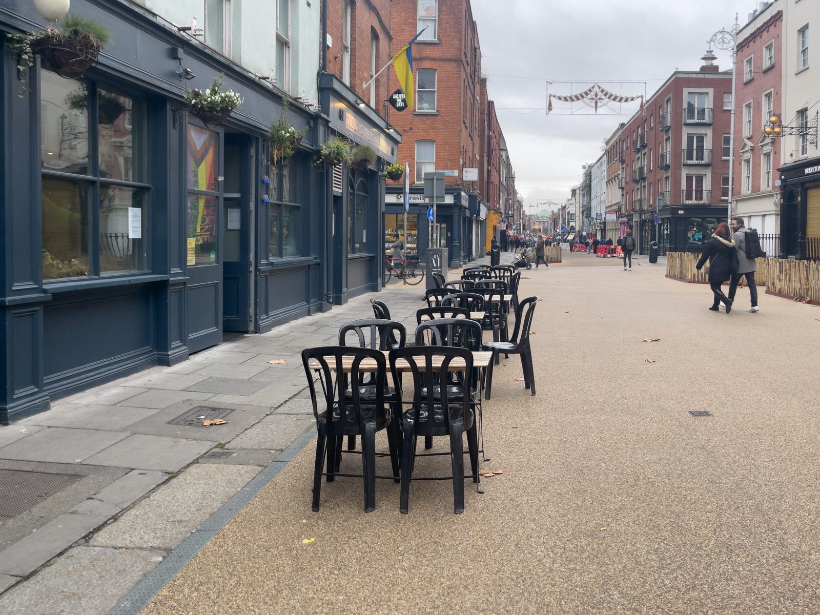 THE NEW STREET FURNITURE IS BEING INSTALLED ON CAPEL STREET [BUT THERE ARE FEW VISITORS TO BE SEEN TODAY]-225419-1