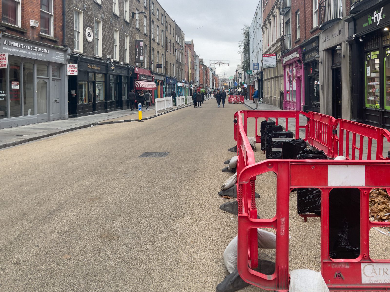 THE NEW STREET FURNITURE IS BEING INSTALLED ON CAPEL STREET [BUT THERE ARE FEW VISITORS TO BE SEEN TODAY]-225423-1