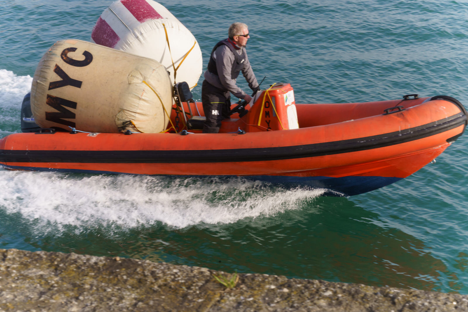 A MAN AND HIS TWO BUOYS IN A RIB [DUN LAOGHAIRE HARBOUR WEST PIER] 003