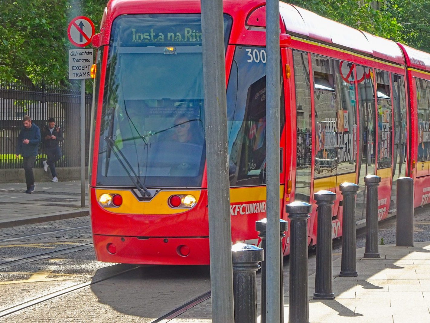 A VERY DISTINCTIVE RED TRAM PROMOTING KFC [AN EXAMPLE OF FULL BODY ADVERTISING REFERRED TO AS WRAPPING]-236690-1