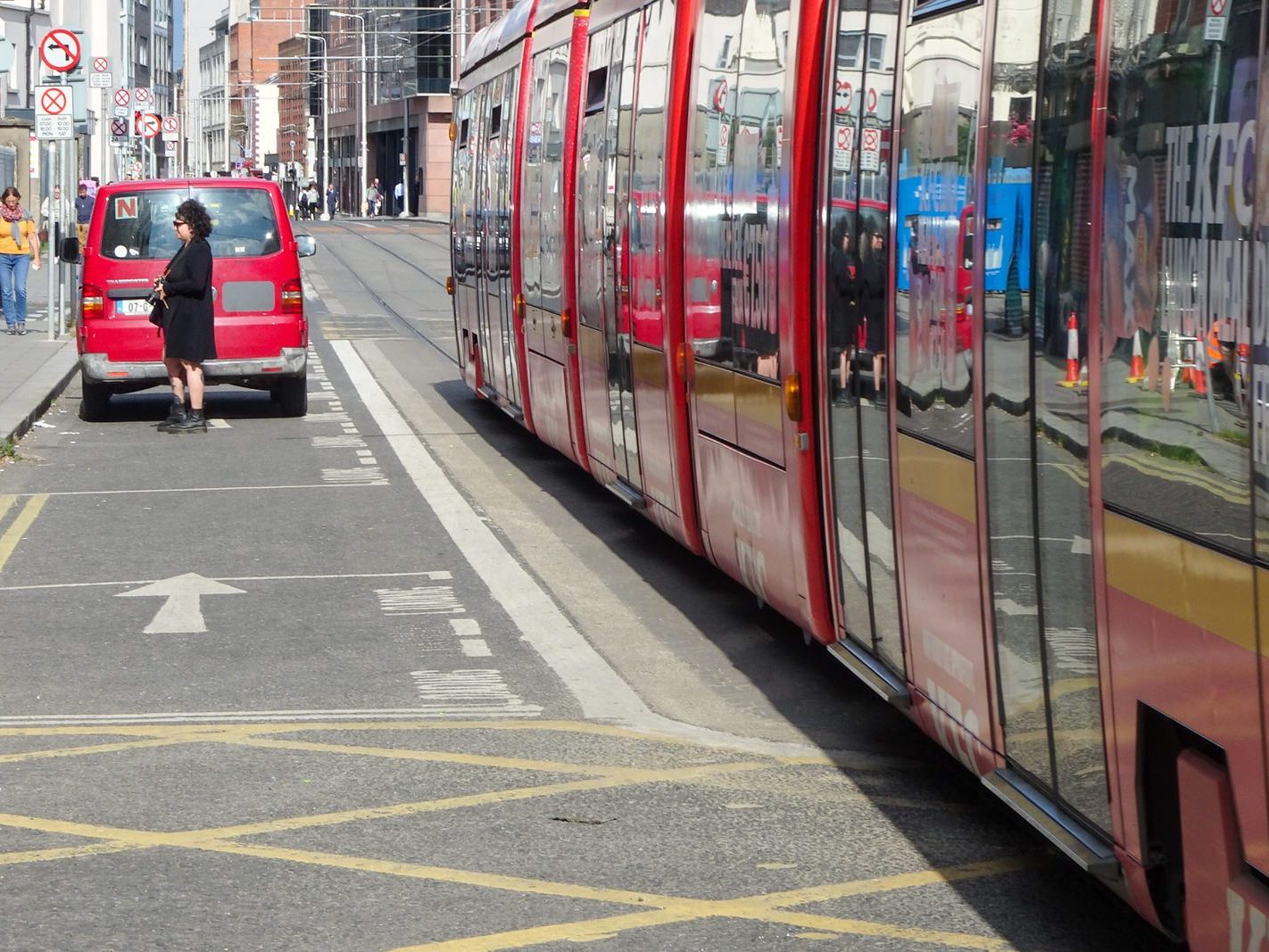 A VERY DISTINCTIVE RED TRAM PROMOTING KFC [AN EXAMPLE OF FULL BODY ADVERTISING REFERRED TO AS WRAPPING]-236695-1