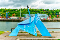 THEIR GENERIC RED METAL SCULPTURE IS BLUE 002