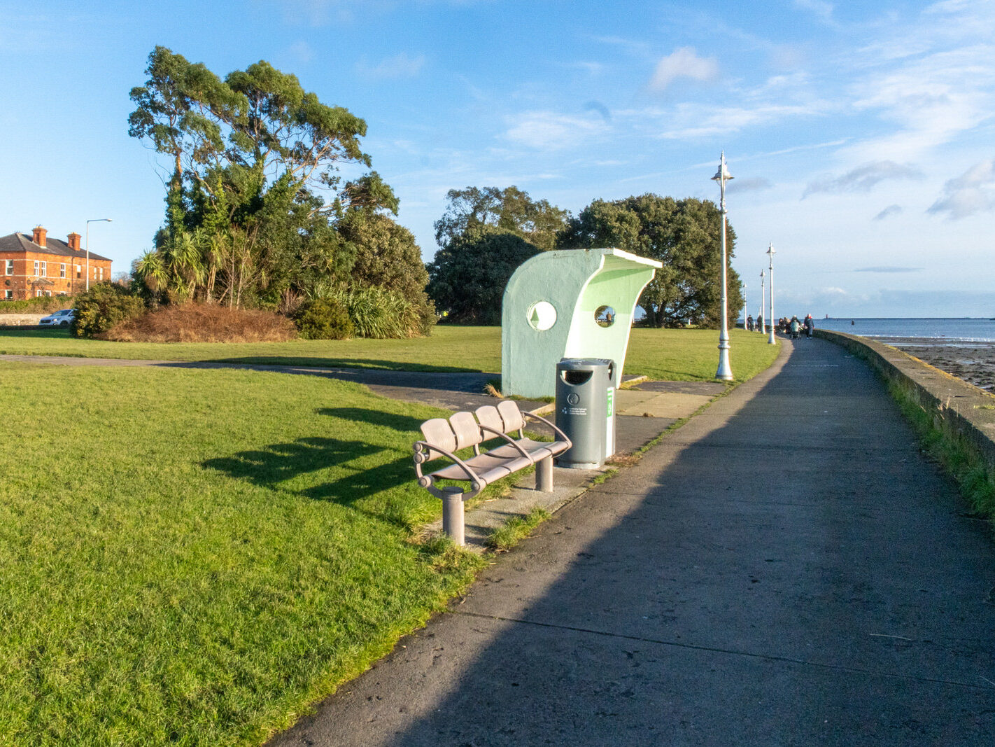 THE WIND SHELTERS AND THE BANDSTAND ALONG CLONTARF PROMENADE [REMAIN AS A TRIBUTE TO HERBERT SIMMS]-246827-1