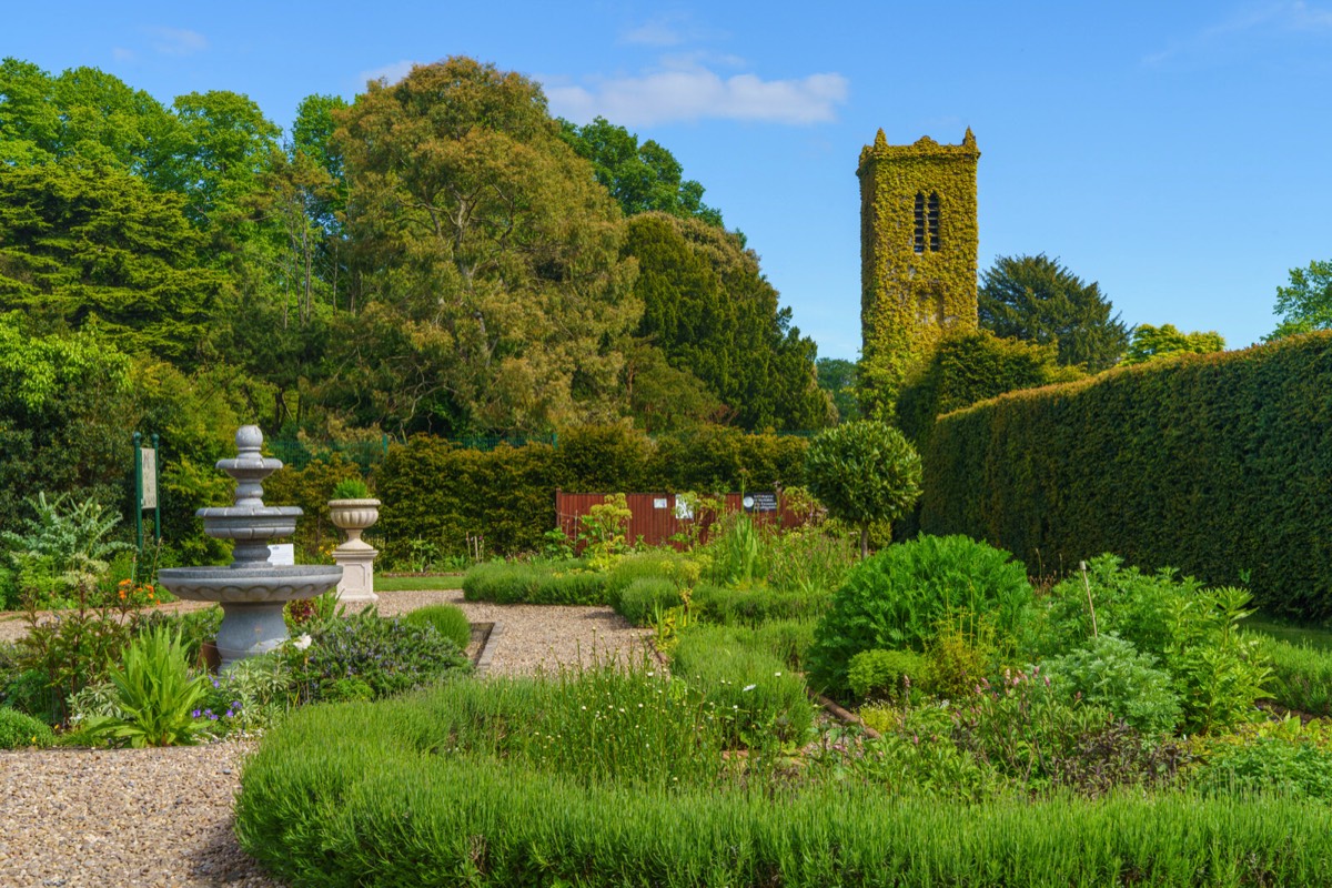 THE CLOCK TOWER IN THE WALLED GARDEN AT SAINT ANNE