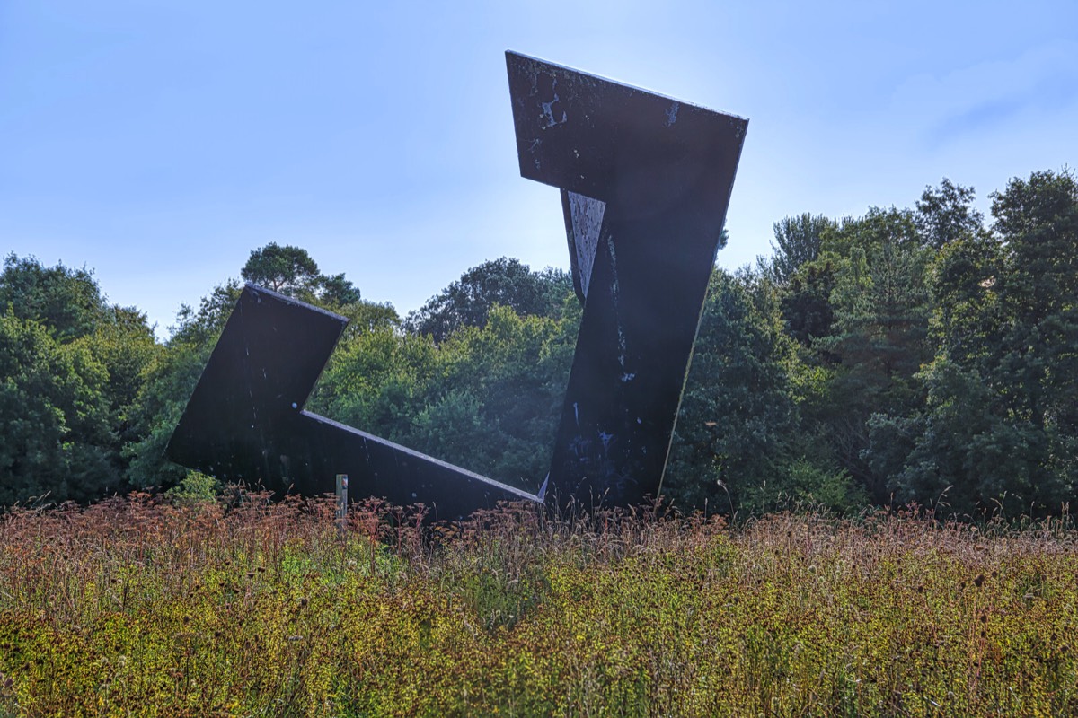 BLACK STEEL SCULPTURE BY MICHAEL WARREN