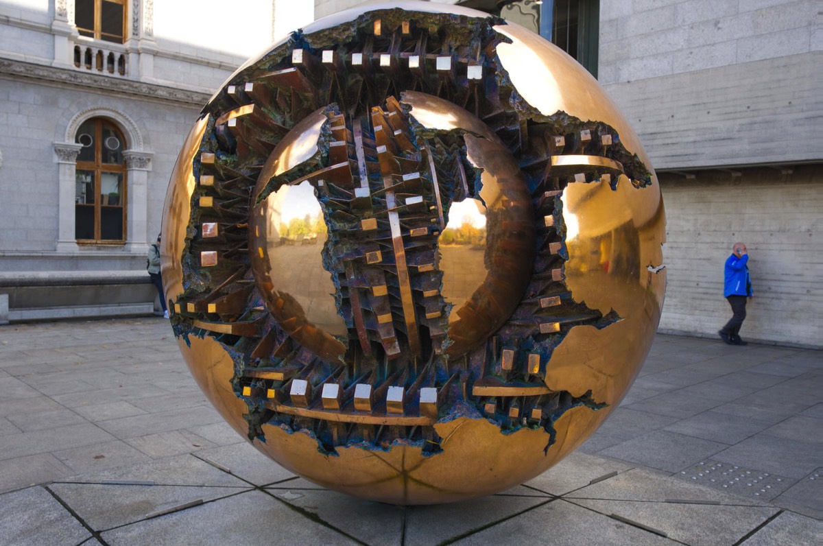 SFERA CON SFERA BY ARNALDO POMODORO